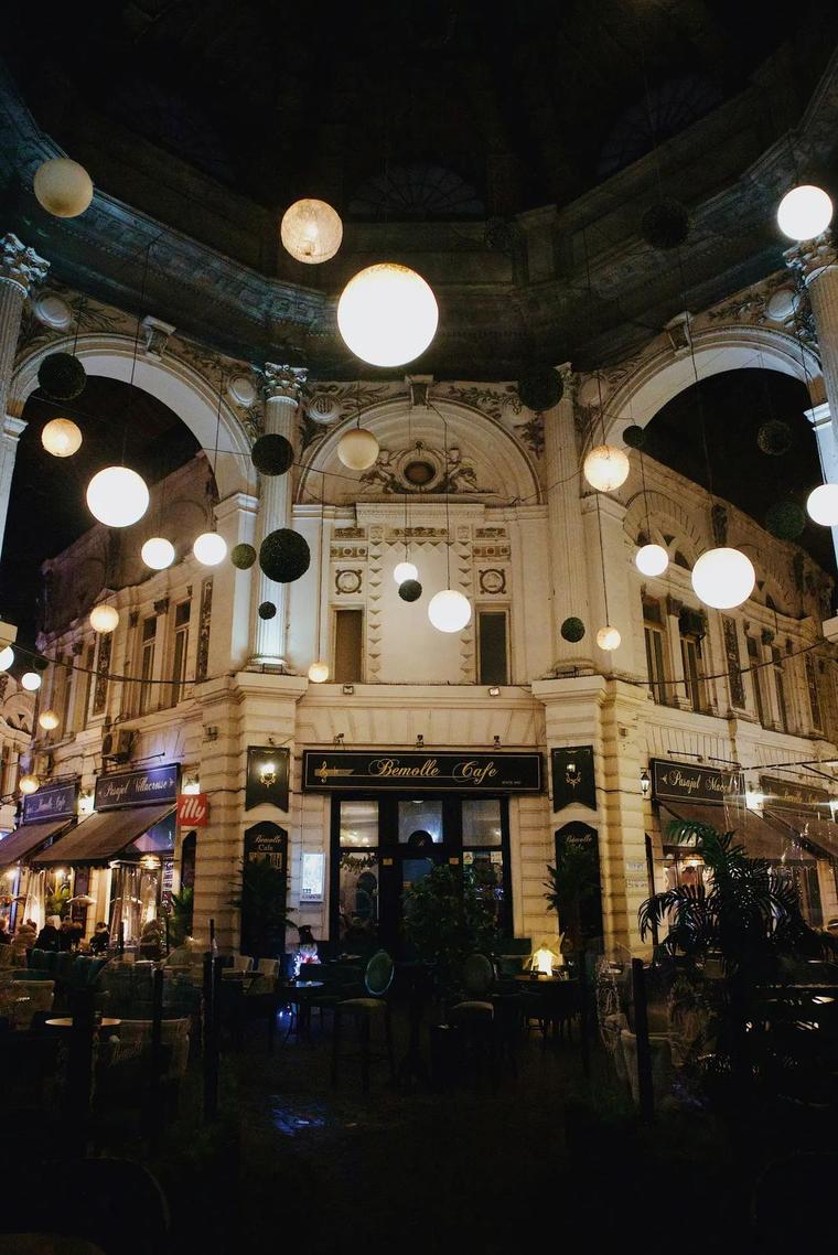Bucharest Old Town at night, lit up and lively