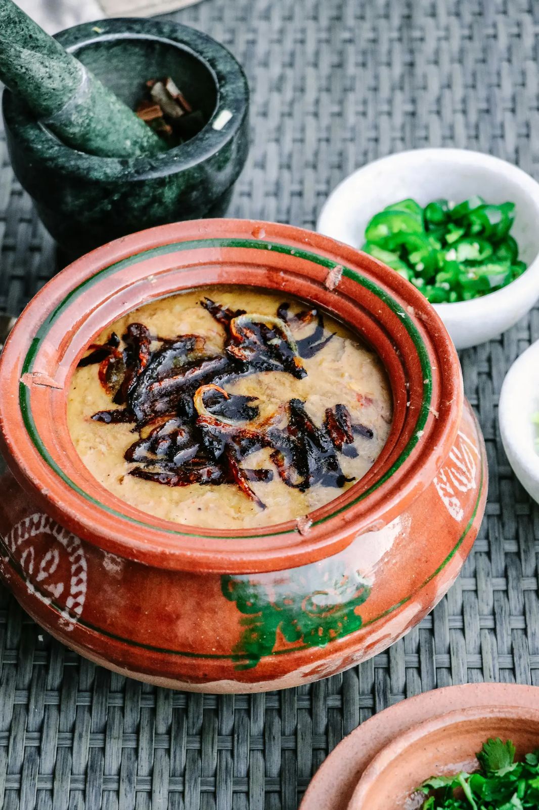A traditional bowl of Romanian ciorbă sour soup