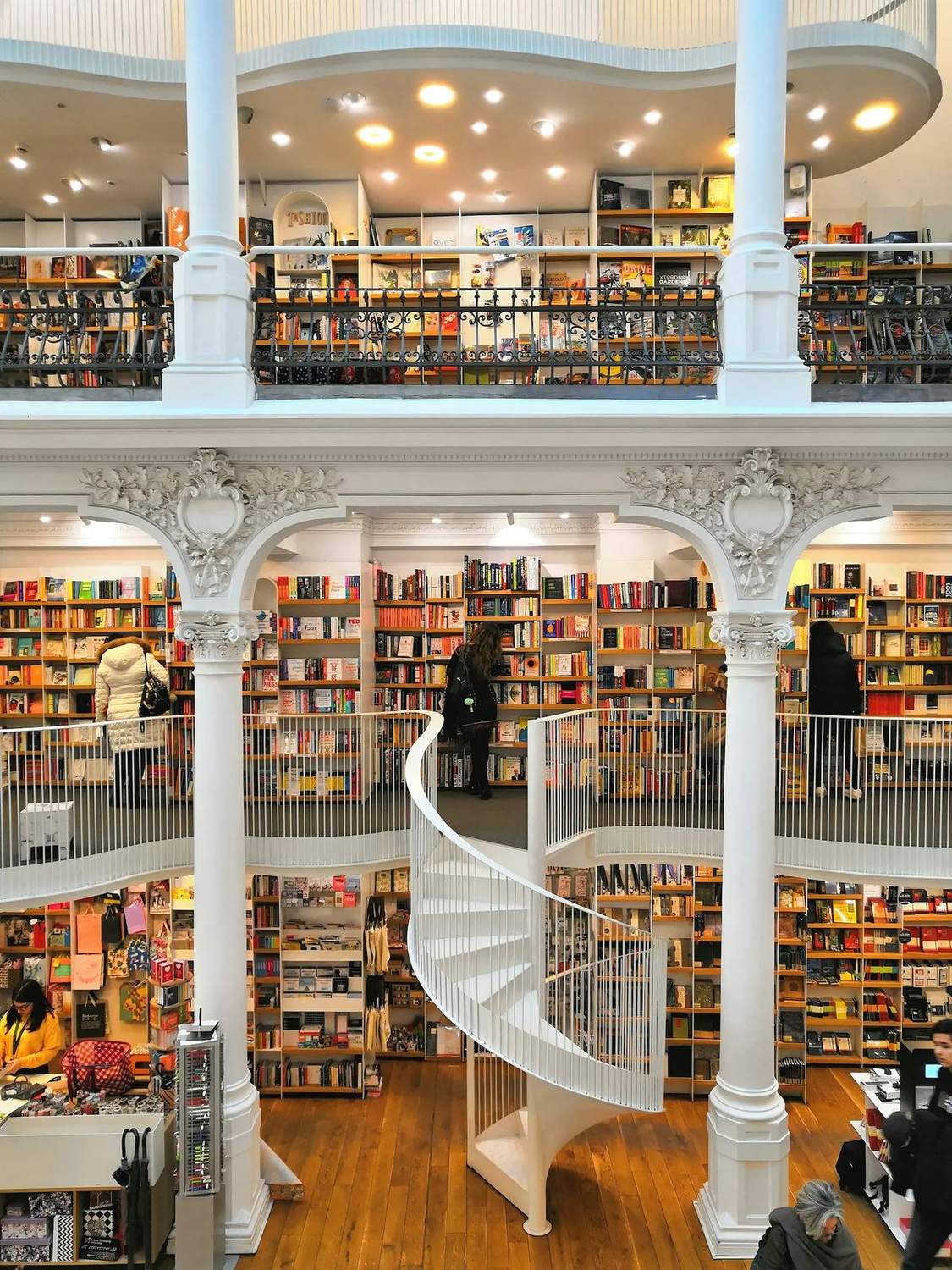 The spiral staircase inside Cărturești Carusel bookstore in Bucharest